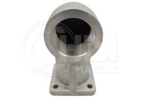 A white metal object sitting on top of a table.