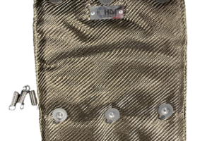 A bag of silver fabric with metal rivets.