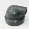 A black plastic pipe sitting on top of a table.