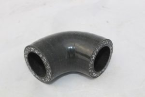 A black hose is bent to the side.