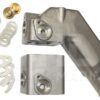 A pair of metal parts with some white plastic and brass hardware.