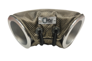 A pair of exhaust manifolds are wrapped in fabric.