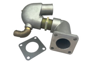 A silver metal elbow with a brass pipe and a steel plate.