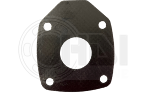 A black gasket that is sitting on the ground.
