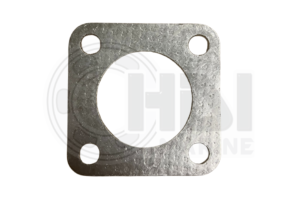 A metal gasket that is sitting on the ground.